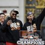 San Francisco Giants third baseman Pablo Sandoval, left, and second baseman Marco Scutaro, right, of Venezuela, smile while standing at the podium during the baseball team's World Series victory celebration at City Hall Wednesday, Oct. 31, 2012, in San Francisco. Sandoval was the World Series MVP and Scutaro was the MVP of the National League Championship Series. The team's second championship in three years included a parade along Market Street and ended with a celebration in front of City Hall. (AP Photo/Marcio J. Sanchez)